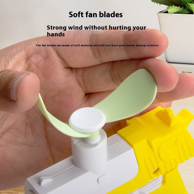 Radish Gun Little Fan Mini-Portable 668bb8bf 6357 4b0d a4bd d355454ee075 trans