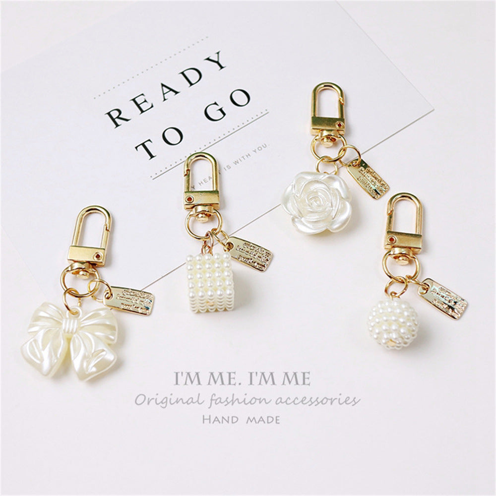 Cross-border Rose Bow Pearl Tassel Key Chain Car Pedant Decoration O1CN01GYtlK129U7Aitltdh 2217109788070 0 cib