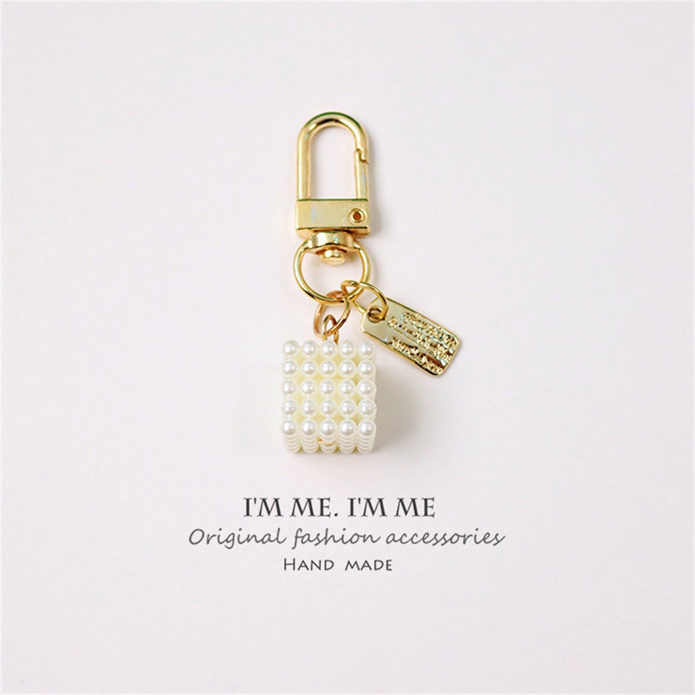 Cross-border Rose Bow Pearl Tassel Key Chain Car Pedant Decoration O1CN01MncctV29U7AgzWTrg 2217109788070 0 cib