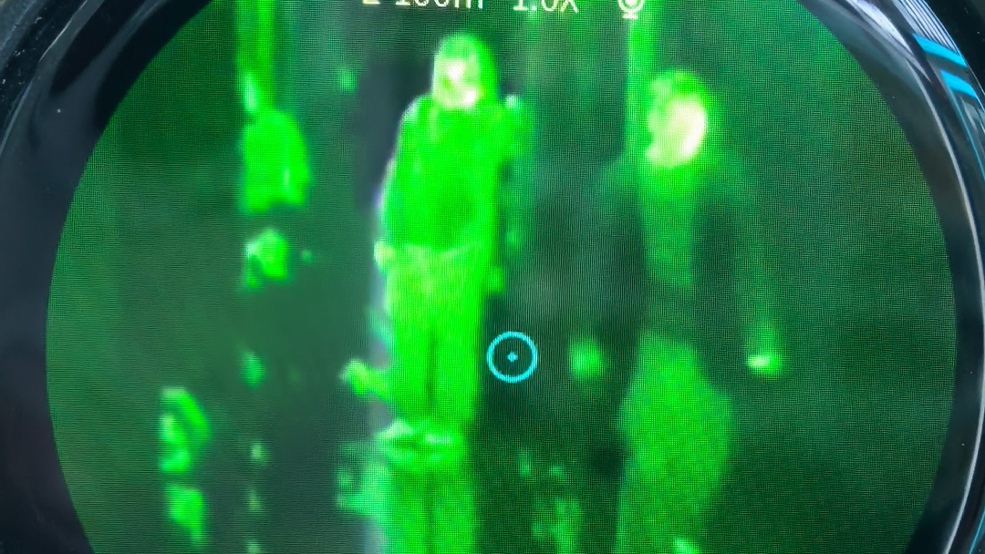 The device shown in the video is a handheld thermal imaging monocular.