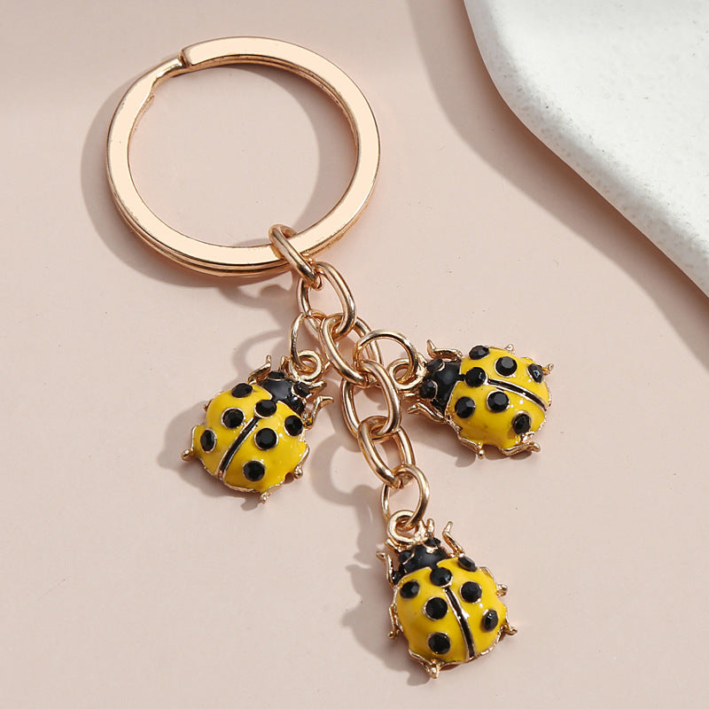 Hot Selling Dripping Oil Alloy Colorful Owl Ladybug Dark Flower Ghost Face Keychain Bag Ornaments 01a0dc52 c864 4b09 92be fb0