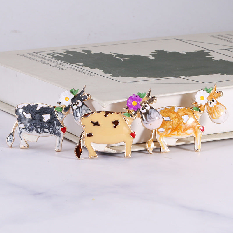 Fashion Alloy Dripping Oil Small Flower Cow Brooch 03baf07e 836a 4a75 9673 d1964623409c