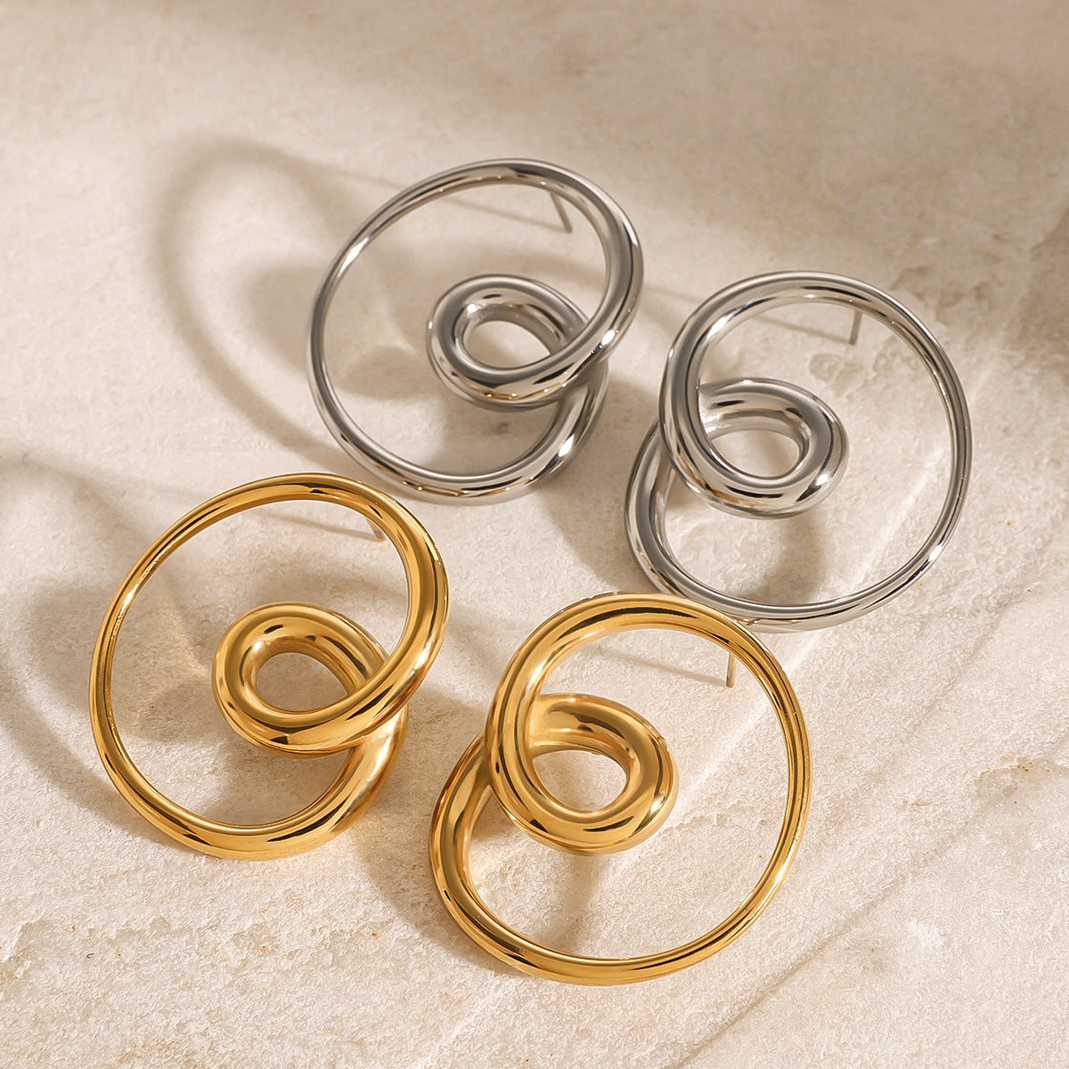 Stainless Steel Rotating Hollow Ear Studs
