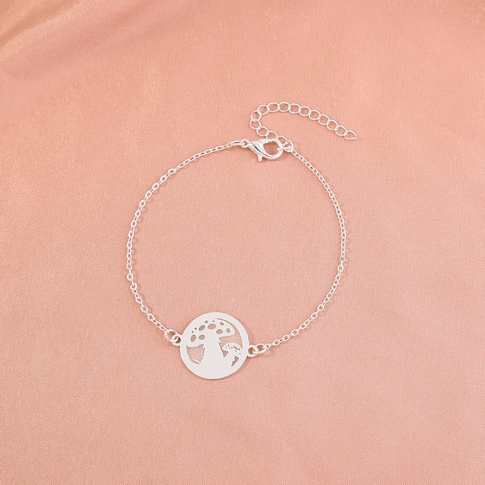 Glow-in-the-dark round brass mushroom bracelet 1124e599 7f78 403c 91b6 b47dd007f3d5