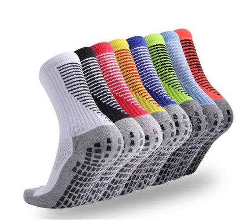 Sports man in striped football socks 1199623580984
