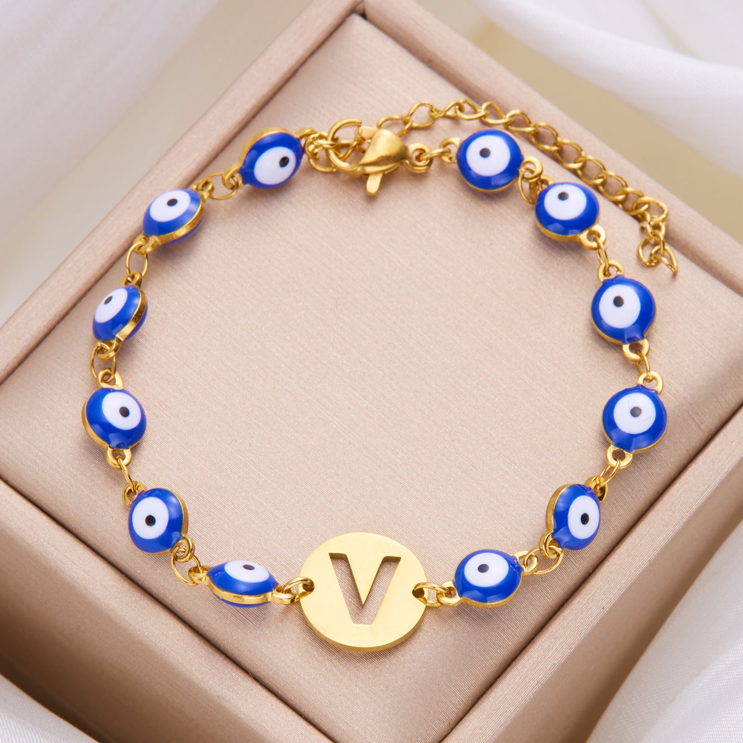 Women's High-grade Stainless Steel Blue Eyes Fashion Hollowed-out 26 Letter Bracelet 126bb656 5c90 42ad 95d1 d61d3d13157c