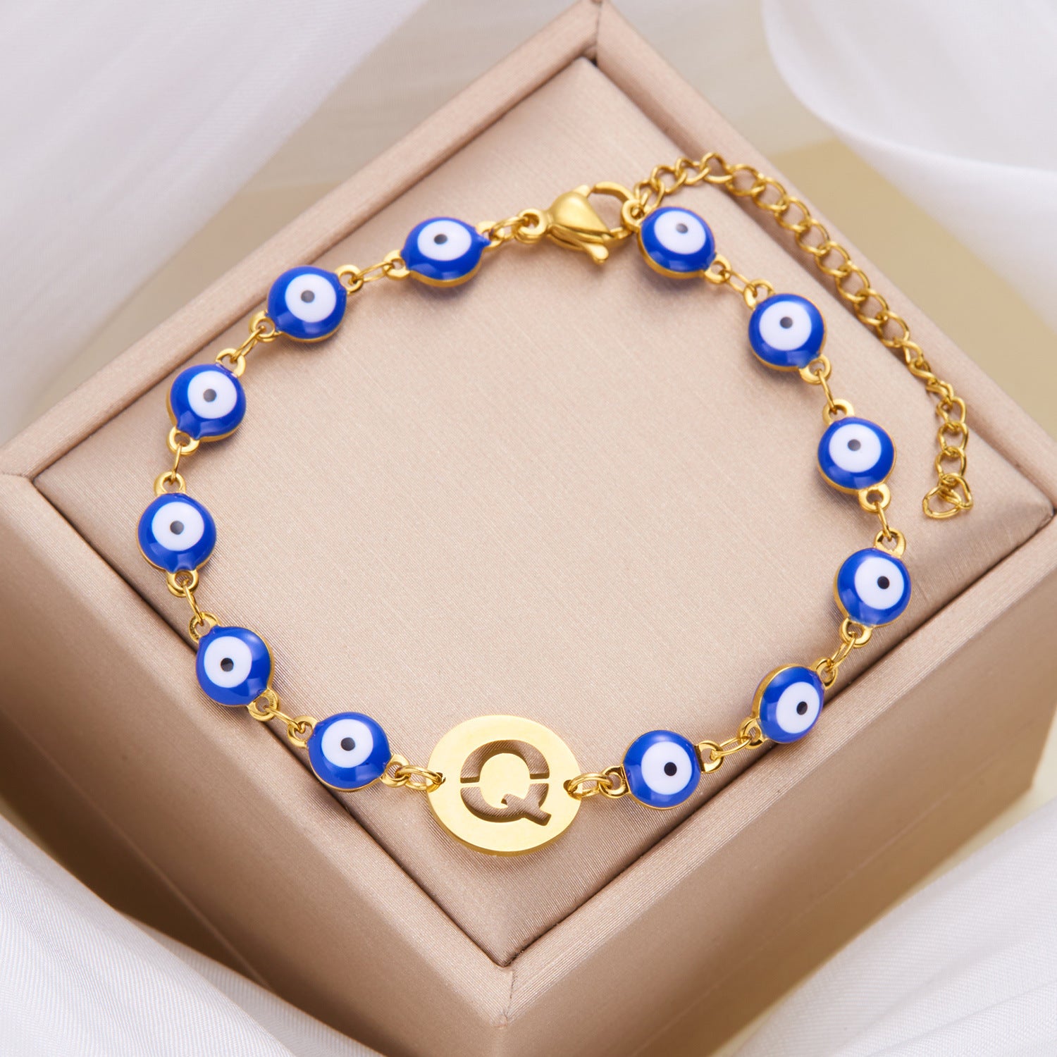 Women's High-grade Stainless Steel Blue Eyes Fashion Hollowed-out 26 Letter Bracelet 12f96497 25f1 464b b080 f276308992a3