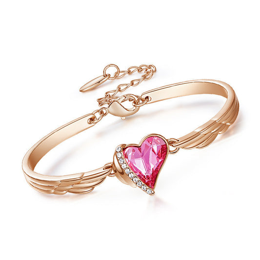 Pink angel wings bracelet 1412474326105