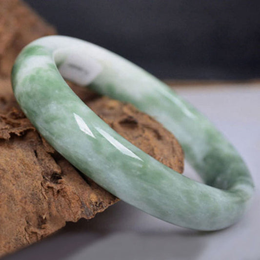 Floating green jade bracelet 1558395083846