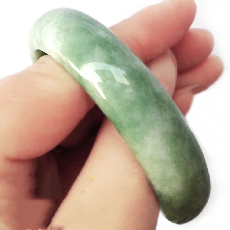Floating green jade bracelet 1869771260754
