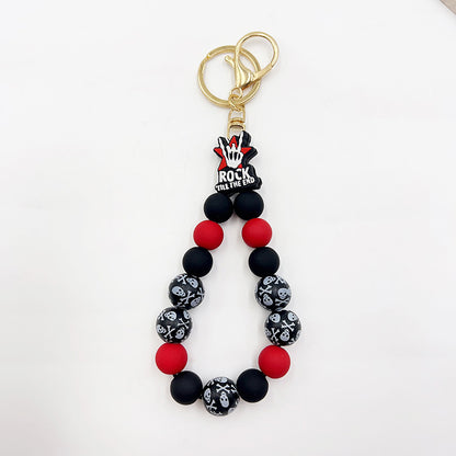 Silicone Wooden Beads Bracelet Keychain 19477c39 fcaa 4c6f 8ea8 7a1e4ac321ce