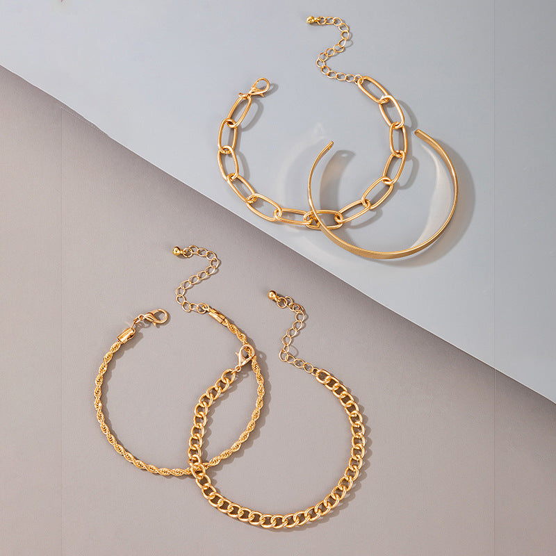 Exaggerated And Minimalist Gold Thick Chain Bracelet Set Of Four Pieces 1c296b28 fbb9 45db a356 839fcd5d75ba