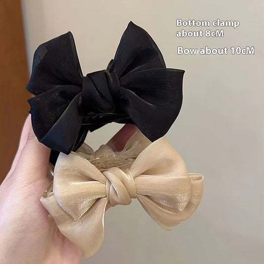 Elegant Bow Bun Grip Female Online Influencer 1deb7010 722b 4461 b9d0 84c5336c09af trans