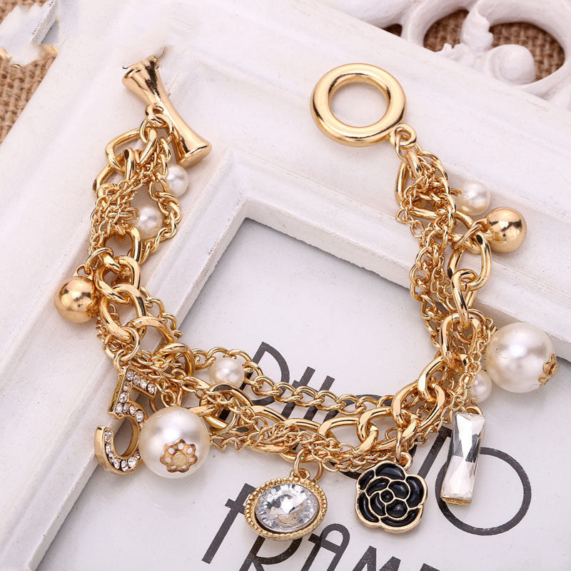 Multi-layer pearl bracelet 2511171375070 69624745 504d 4731 917e ced0c2e2ec85