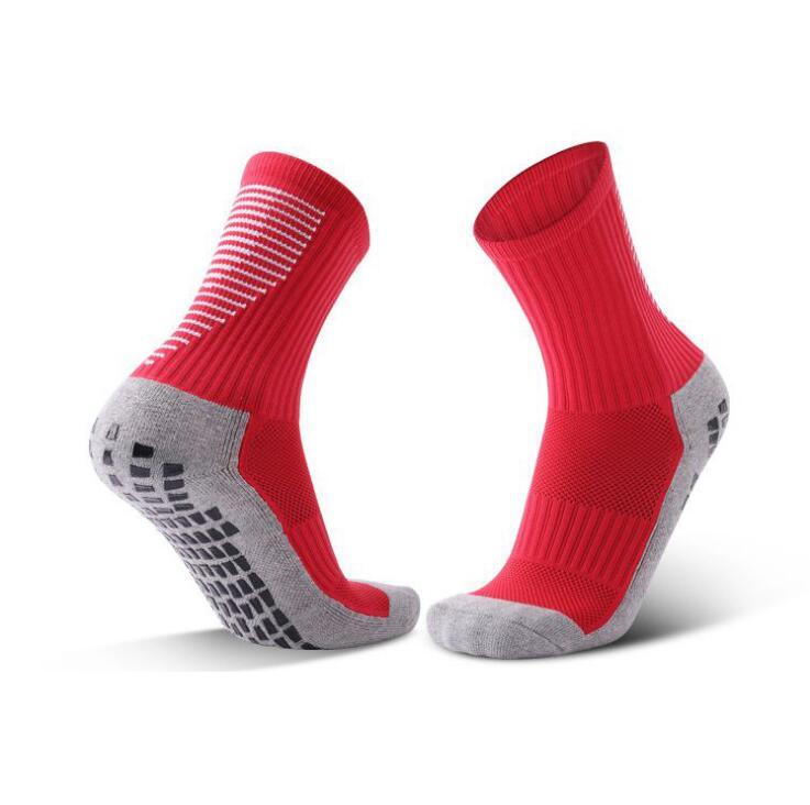 Sports man in striped football socks 2522598486756