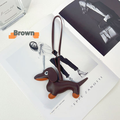Sausage Dog Carrying Strap Bag Ornaments 2d0cfd67 cadc 479a b6f8 ac6a73843949 trans