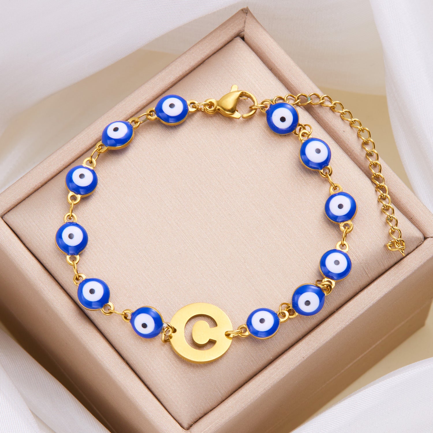 Women's High-grade Stainless Steel Blue Eyes Fashion Hollowed-out 26 Letter Bracelet 333549bf 9ef0 4268 b4cb 572340b19ec3