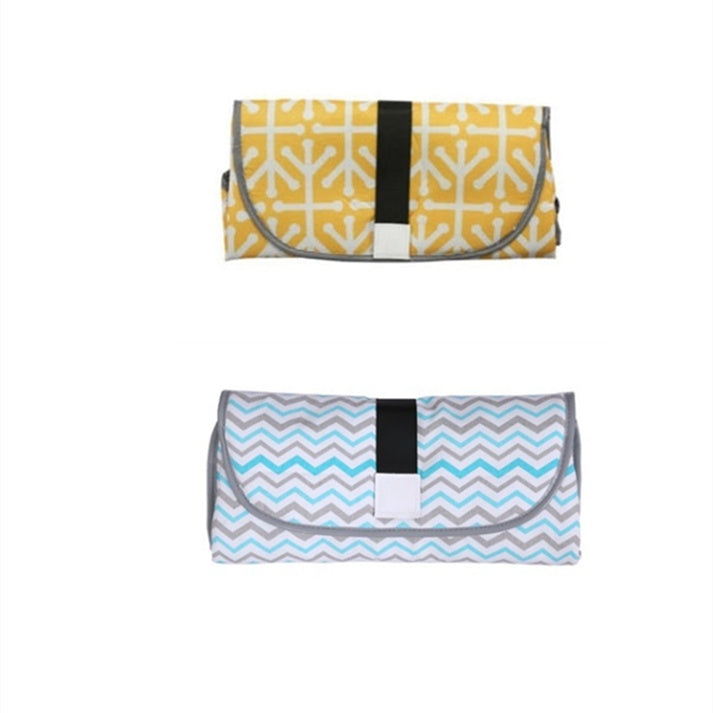 Convenient baby changing pad 34ae3394 7f1e 4fab 94ea 7a9f05bf0ad9