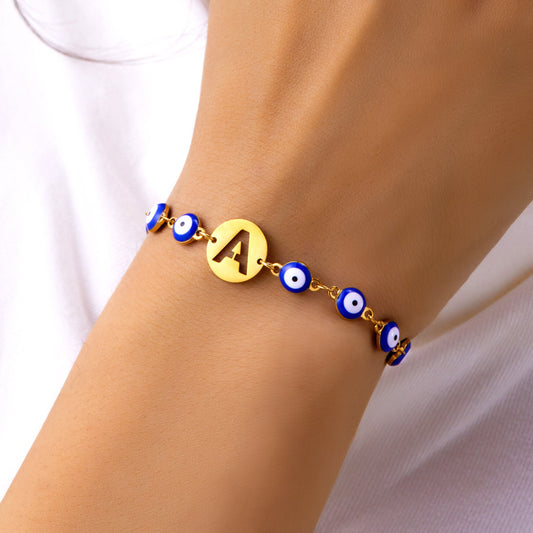 Women's High-grade Stainless Steel Blue Eyes Fashion Hollowed-out 26 Letter Bracelet 35300b65 9238 4320 829c 0e4c8a4afae9