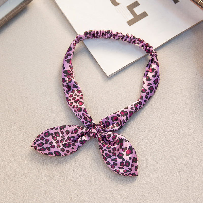 Big bow tie bunny ears headband 4029140805498