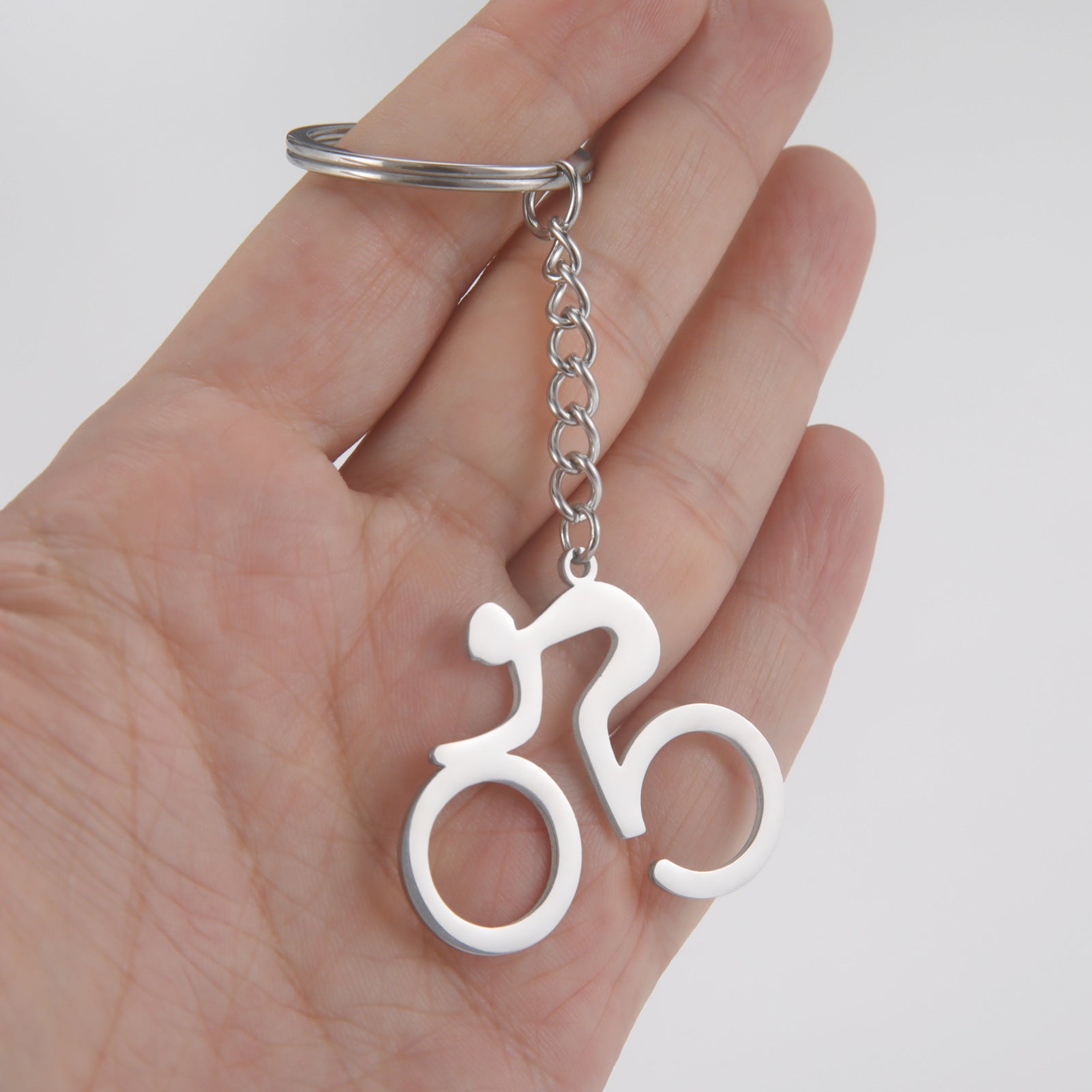 Gexiang Factory Titanium Steel Cutting Hollow 18K Real Gold Electroplating Simple Stroke Bicycle Pendant Stainless Steel Key 