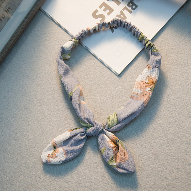 Big bow tie bunny ears headband 5068485187023