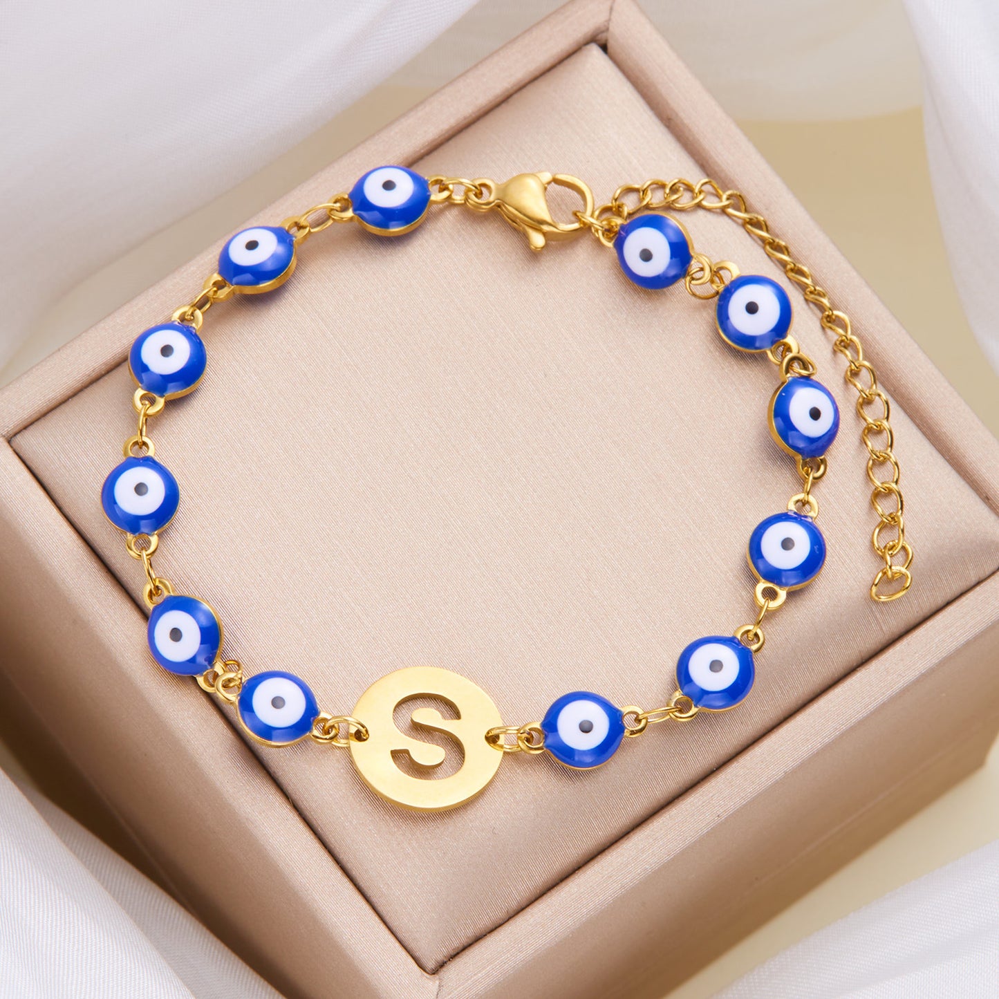Women's High-grade Stainless Steel Blue Eyes Fashion Hollowed-out 26 Letter Bracelet 53d4ab62 e6fe 4ab8 b352 3804ecc7d298