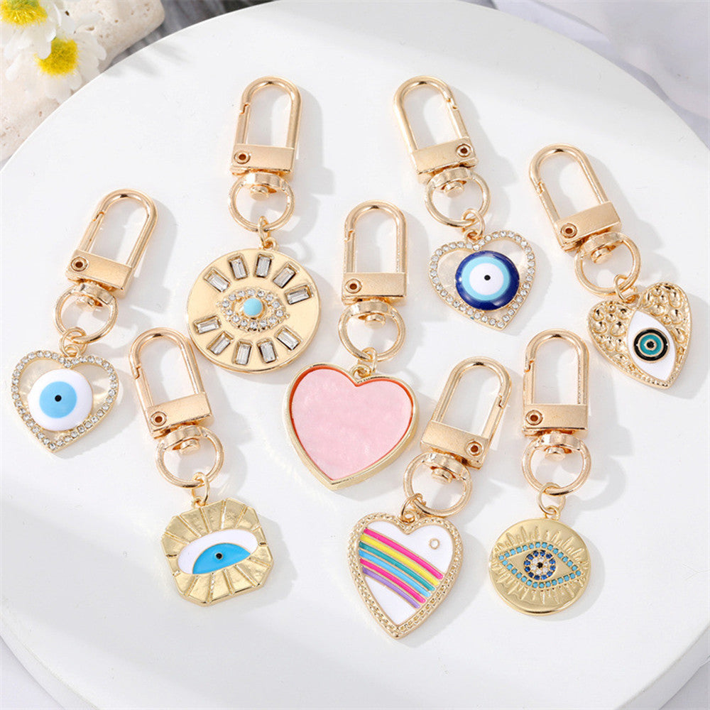 Dot Drilling Alloy Love Eye Keychain 5a2ca405 6a78 4f83 aee3 6601278fbc50