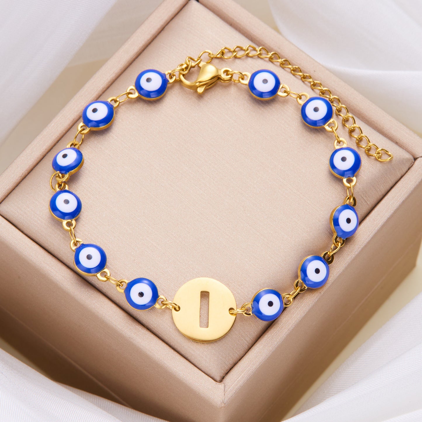 Women's High-grade Stainless Steel Blue Eyes Fashion Hollowed-out 26 Letter Bracelet 5de343b1 1859 44ef b41c 0eafbc23e714