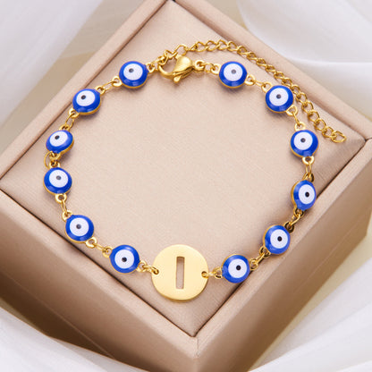 Women's High-grade Stainless Steel Blue Eyes Fashion Hollowed-out 26 Letter Bracelet 5de343b1 1859 44ef b41c 0eafbc23e714