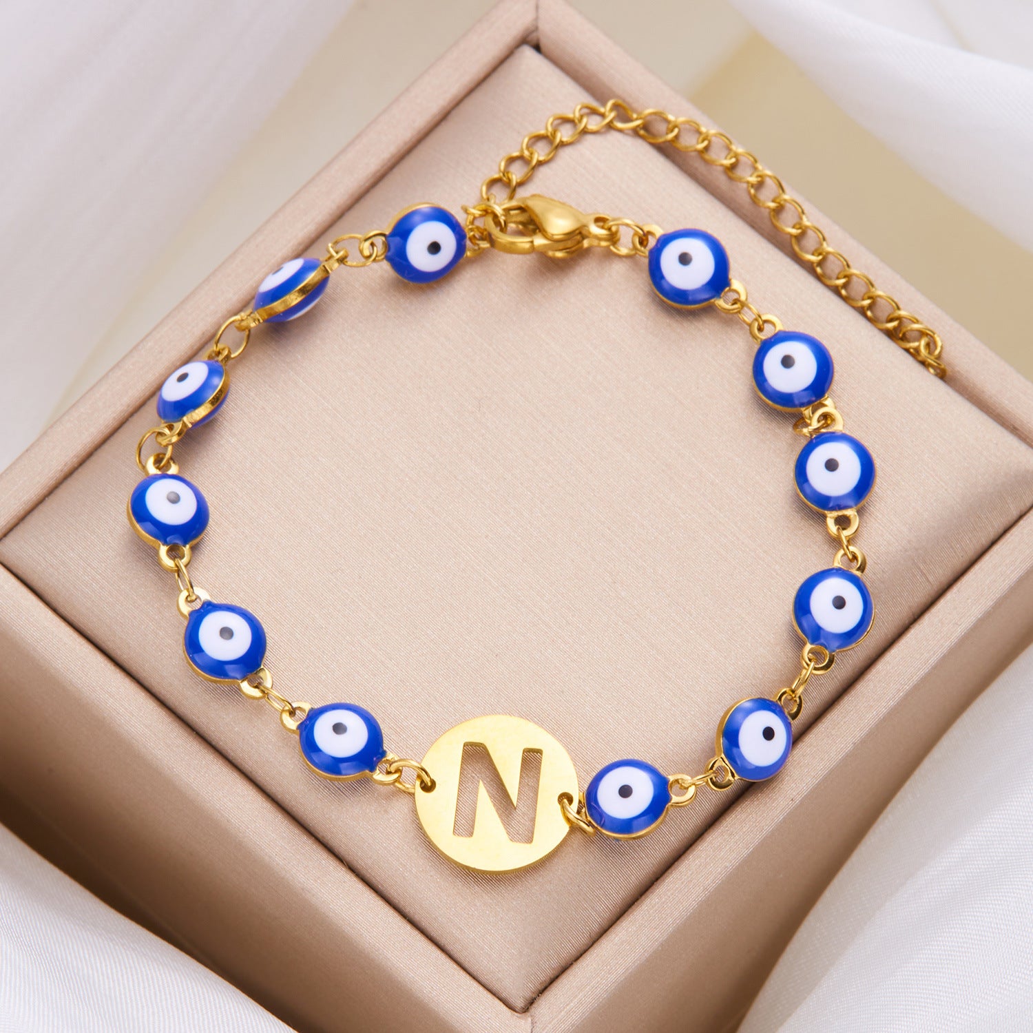 Women's High-grade Stainless Steel Blue Eyes Fashion Hollowed-out 26 Letter Bracelet 5fd92cbf 00bd 4498 8e82 051e69a456fa