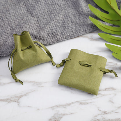 Microfiber Leather Jewelry Clamshell Bag 6157c5f6 6b3a 43f6 a89f 14d2baf981b7