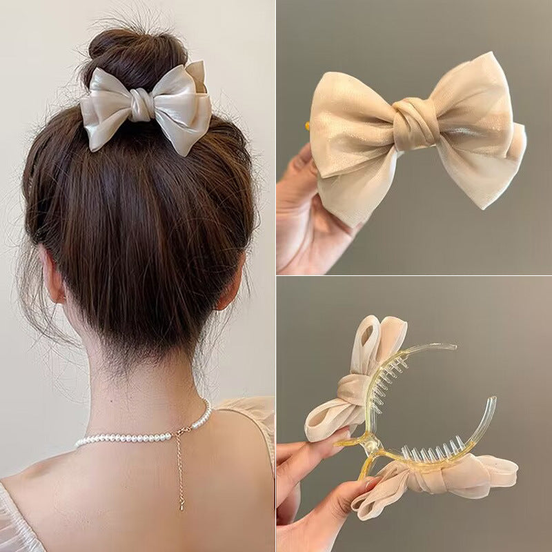 Elegant Bow Bun Grip Female Online Influencer 625b5196 ef7d 43fd 8164 7da068bc60dd