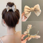 Elegant Bow Bun Grip Female Online Influencer 625b5196 ef7d 43fd 8164 7da068bc60dd