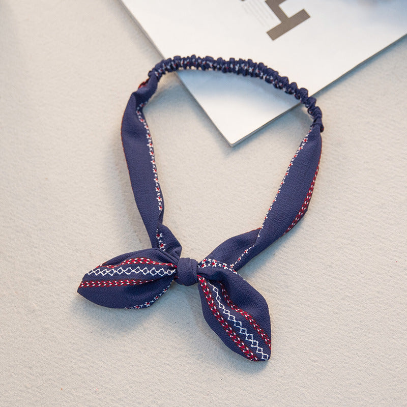 Big bow tie bunny ears headband 627207456387
