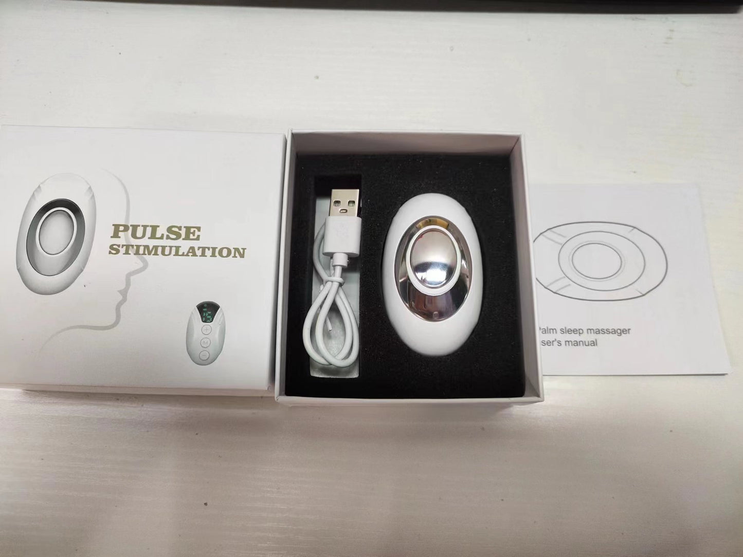 Smart Grip Micro Current Insomnia Help Device 62bc1759 ce68 4139 b29c 84e1bb132c48