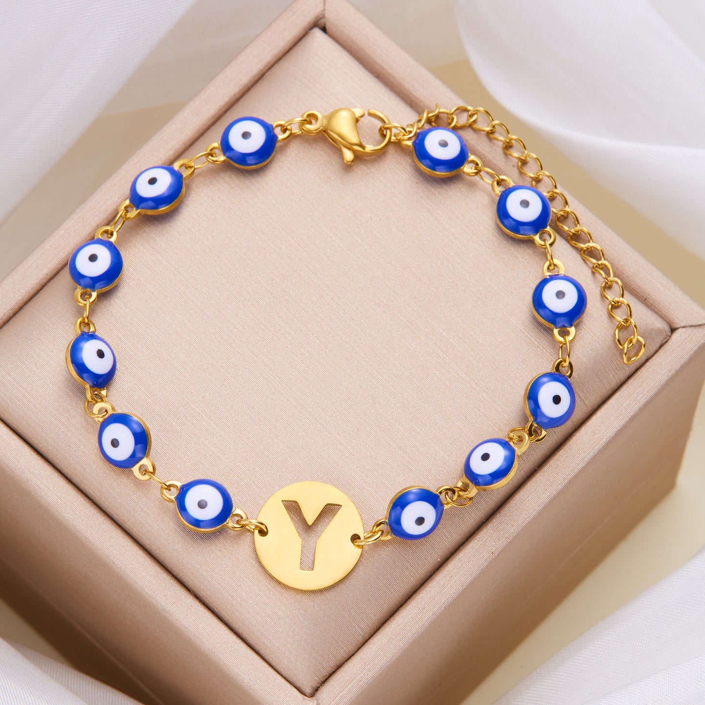 Women's High-grade Stainless Steel Blue Eyes Fashion Hollowed-out 26 Letter Bracelet 68e77743 198e 4a8f a257 d892fcfc920d