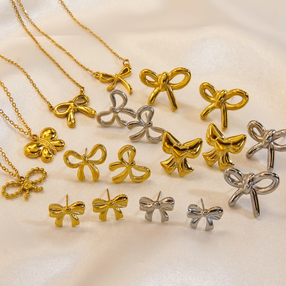 Bow Stainless Steel 14K Gold Earrings Necklace 70c6d200 178e 4054 a06b f5034a53a23c