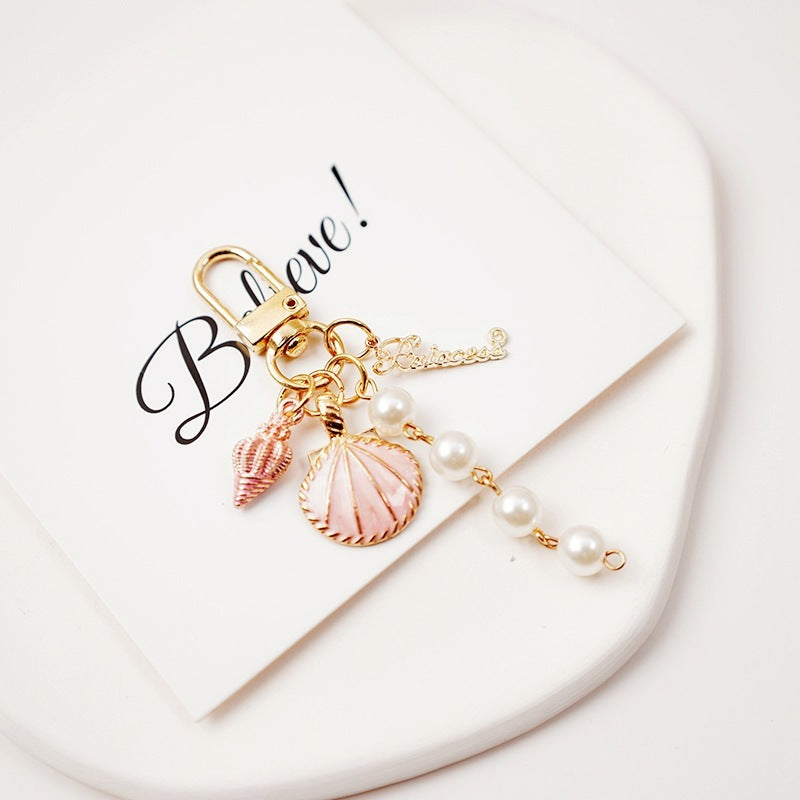 Lovely Pearl Shell Conch Key Chain Pendant 806f2f94 e7ec 4077 a57b 0c8ef7524061