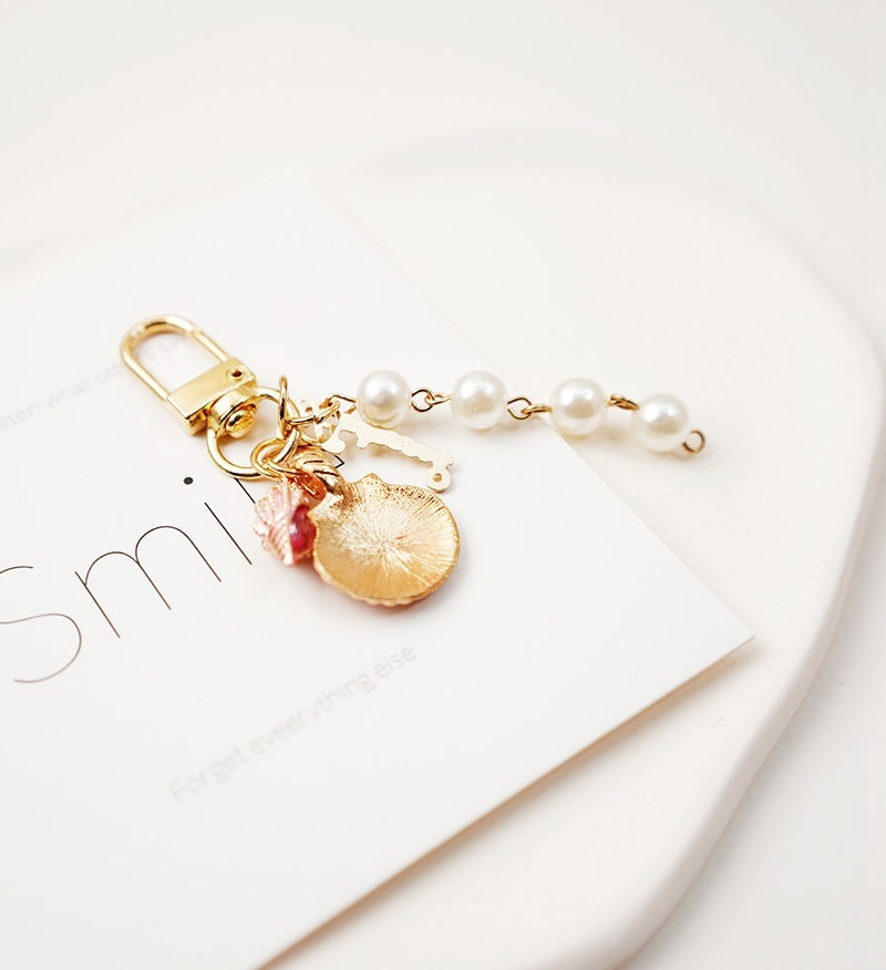 Lovely Pearl Shell Conch Key Chain Pendant 8e913dde 36b9 4f45 a05e d88a013bf09e