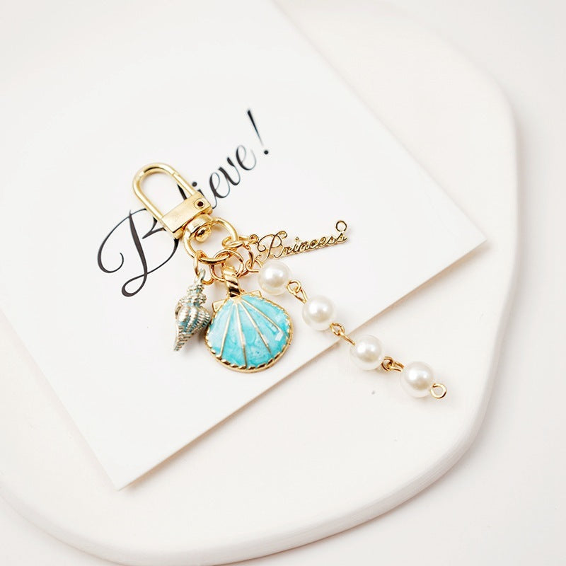Lovely Pearl Shell Conch Key Chain Pendant 8ee5ad78 6896 4f0d 8e6b 8dd7fe3ca20c