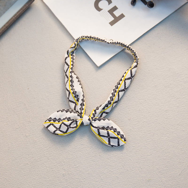 Big bow tie bunny ears headband 9033183669378