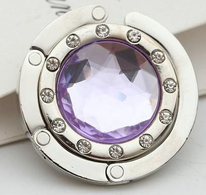 Portable And Practical Folding Crystal Bag Hanger 90575b09 f146 46ab a423 b1edd40827ec