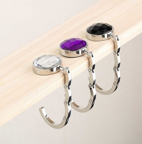 Fashion ladies crystal bag hook personality purple diamond metal bag hook 929470115463