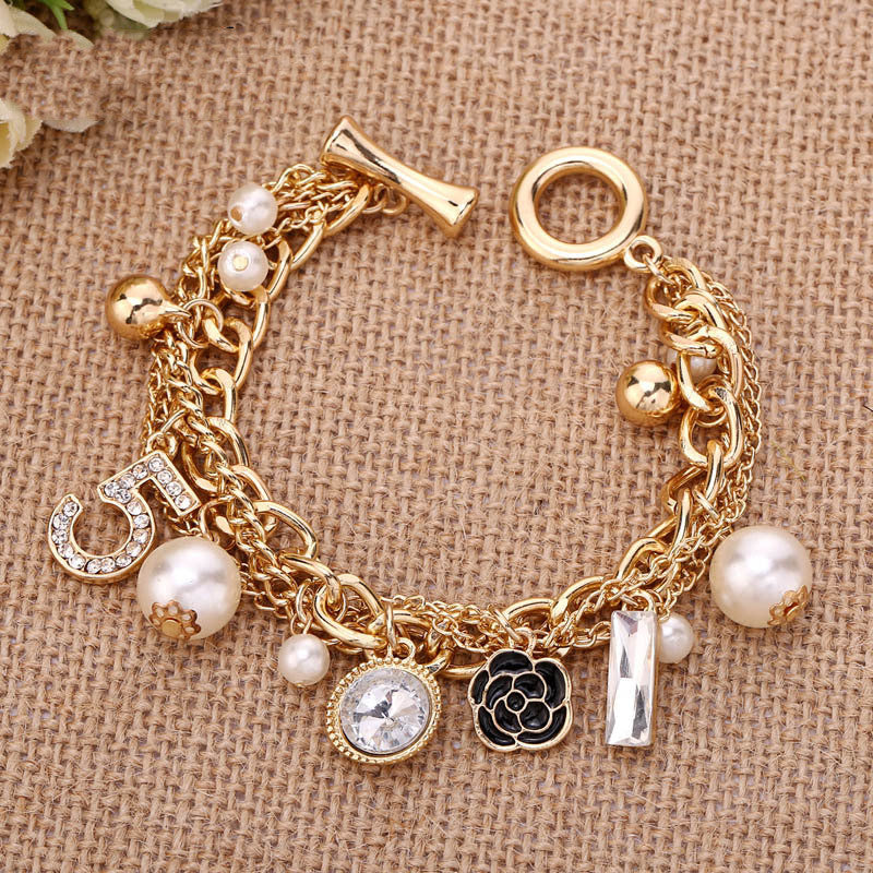 Multi-layer pearl bracelet 945547404653