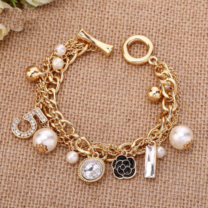 Multi-layer pearl bracelet 945547404653