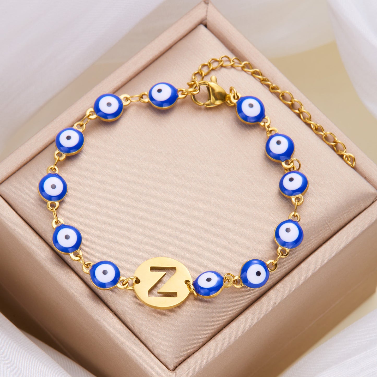 Women's High-grade Stainless Steel Blue Eyes Fashion Hollowed-out 26 Letter Bracelet 958080c3 4f98 431c aeac fb2135a300ff