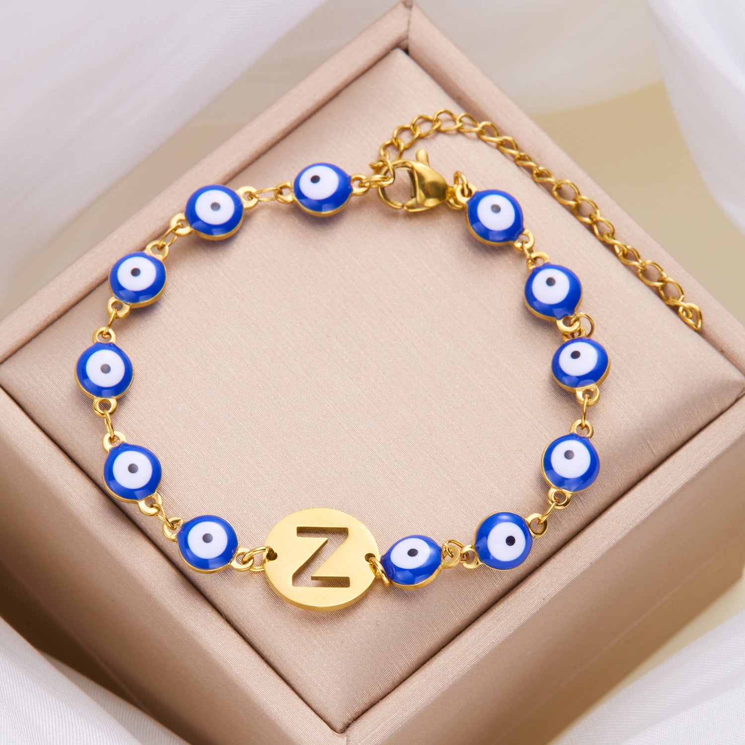 Women's High-grade Stainless Steel Blue Eyes Fashion Hollowed-out 26 Letter Bracelet 958080c3 4f98 431c aeac fb2135a300ff