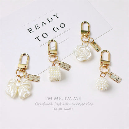 Cross-border Rose Bow Pearl Tassel Key Chain Car Pedant Decoration O1CN01GYtlK129U7Aitltdh  2217109788070 0 cib