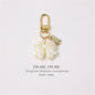 Cross-border Rose Bow Pearl Tassel Key Chain Car Pedant Decoration O1CN01UngSnb29U7AfTXXxR  2217109788070 0 cib